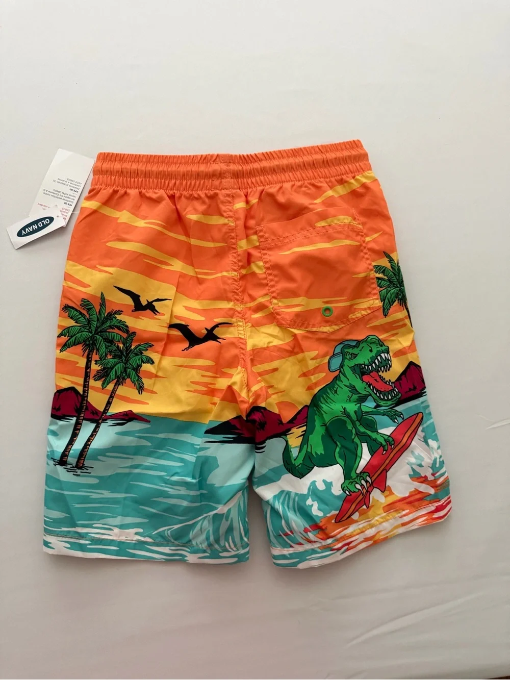(NWT) Old Navy Boy’s Dinosaur 🦖 Swim Trunks in Orange/Multi, Large (10/12)
